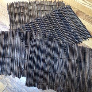 Used and great condition set of four twig placemats.